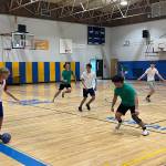 Portugals Daniel Boyle pressed Englands Quill Tegenfeldt-Pfohman, while Isaac Newcomb and August Kampmeier called for the quick counter-attack and Leo Neidinger dashed back into formation (Photo by John Thomas).
