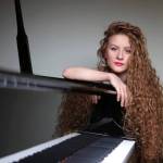 Asiya Korepanova, a virtuoso pianist, is returning to Vashon to play music by Sergei Rachmaninoff (Courtesy Photo).