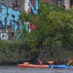 A still from An American River shows Mary Bruno and Carl Alderson kayaking down the lower 17 miles of the Passaic River (Scott Morris Productions Photo).