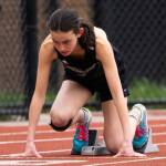 Freshman Emily Harrington, an instant before exploding out of the blocks in the girls 400-meter dash (John Decker Photo).