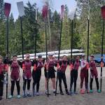 (Left to right) Caroline Barnes, Taylor Huffman, Ella Jones, Paige Gibbons, Haley Hopper, Sacia Thompson, Brisa Ordonez, Keziah Rutschow, and Ella Odegard pose for a picture after their successful row in an 8. They didnt realize it at the time, but the clubs new 8 is behind them in the picture, generously donated by the University of Oregon (Eric Odegard Photo).