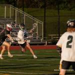Davis Rice runs the ball and Ryan Noonan watches for a pass (Spencer Mazur Photo).