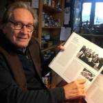 Islander Martin Koenig holding his art book Sound Portraits From Bulgaria: A Journey Into a Vanished World 1966-1979 (Elizabeth Shepherd Photo).