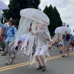 Shimmery and colorful costumes abounded in Vashon Island Marine Band and Procession, in last years Strawberry Festival parade (Tom Hughes Photo).