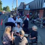 Streetside cafes popped up on the evening of June 2, increasing business for local eateries (Amy Drayer Photo).