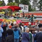 The caboose of the parade for the VHS class of 2023 was a pontoon boat, filled with 11 VHS graduates, towed by a truck (Jim Diers Photo).