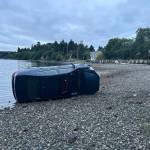 VIFR Photo
An accident that took place in the early morning hours of June 24 landed a mid-sized Volkswagen sedan on a beach near Portage. VIFR treated and transported two passengers in the car to Harborview Hospital, in Seattle.