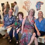 (Left to right) Jon, Brette and Shannon Flora, joined by Barbara Dusty Gustafson, take in the scene on the opening night of VCAs Summer Arts Fest, at Vashon Center for the Arts. Both Brette and Gustafson are local artists, with work in the first round of shows for the annual festival (Elizabeth Shepherd Photo).
