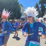 Members of the Vashon Island Marine Band and Procession joyously marched through Vashon in this years Strawberry Festival Parade (Tom Hughes Photo).