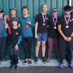 The novice winners from the Vashon Island Rowing Club stand with their ribbons and medals. From left to right: Grayson Hamilton, Alden Metler, Brendan Blower, Colin Simpson (front), Rowan Grace, Grant Fitterer, Jonas Maxfield, Tao Riley, Dorian Britz, and Finley Graham (Photo by Ben Steele).