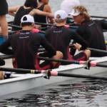 Will Parker, right, congratulates his teammates Nate Wass de Czege, Forest Macnab, and Briar Guenther after their bronze medal row in the Mens U17 Quad (Emeilia Odegard Photo).