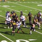 Senior running back Teigin Monson breaks off a 14 yard run in the first quarter against East Jefferson (Courtesy Photo).