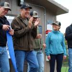 Community members celebrate a ribbon cutting at the new AED SaveStation at the VES fields. Alex Bruell photo