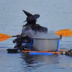 Swapping brooms for paddles, dozens of witches took to Jensen Point Beach last year for the second annual Witches Paddle (Jim Diers Photo).