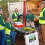 Vashon CERT team leaders work on a project to make sure the units cache of equipment and supplies is in great shape as the winter storm season approaches. From left to right: Marie Bradley, Jan Lyell, MJ Witt, CERT Manager Jan Milligan, and Allen de Steiguer (Rick Wallace Photo).