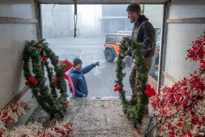 Eloy Carrillo and Nate Schafer distribute Island Christmas decorations for installation and hanging for the Vashon Chamber of Commerce. Terry Donnelly photo