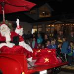Alex Bruell photo
Santa and Mrs. Claus wave to the crowd at WinterFest.