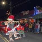 Jim Diers photo
Matt Beursken, as a Christmas-clad Edgar the Forest King (inspired by Vashons own Oscar the Bird King) rolls down Vashon Highway SW.
