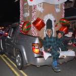 Jim Diers photo
Kids smile for the camera while riding down Vashon Highway SW during the WinterFest parade.