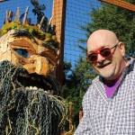 Matt Beursken smiles next to the headpiece of Edgar the Forest King, his Thomas Dambo-inspired troll costume. Alex Bruell photo