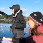 Alex Bruell photo
Cara Borre, left, calls out bird names and counts to Asta Tobiassen, right, who photographs and records the bird numbers on New Years Eve day in Quartermaster Harbor.