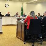 Testifying in favor of HB 1062, a bill to stop deception in interrogations are, from left: Lara Zarowsky, the Executive Director of the Washington Innocence Project; Ted Bradford, the first person in Washington to be exonerated by DNA evidence; and Amanda Knox, a victim of false conviction in Italy (Photo by Aspen Anderson, Washington State Journal).
