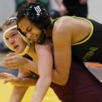 Vashon High School Senior Alex Keyes (right) competes during The Rock Wrestling Tournament on Dec. 28. Alex Bruell photo