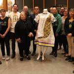 Members of the Seattle Indian Health Board team, at an event at Vashon Center for the Arts that featured (center, behind artwork) Health Board Executive Vice President and artist Abigail Echo-Hawk (Pawnee). (Alex Bruell Photo)