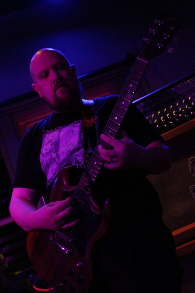Guitarist Cyrus Morosoff, of Gloom Gazer, performs at Sportys. Photo by Alex Bruell.