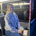 Bailey Naifeh, 16, on an evening bus ride home after working in town. Naifehs bus run is among those that will be cut in the new Metro schedule that launches on April 1 (Elizabeth Shepherd Photo).