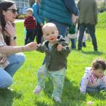 Its all smiles for this carrot-and-bunny-jammies wearing kid after the annual Easter Egg hunt at Ober Park. Alex Bruell photo.