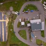 This aerial view shows the Vashon Recycling and Transfer Station with its relatively new solar array, which produces about 172,000 kilowatt hours of electricity annually (Photo courtesy King County).