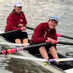 Burton Beach Senior rowers Kez Rutschow (left) and Sasha Thompson (right) headed to the start line (Tricia Thompson Photo).