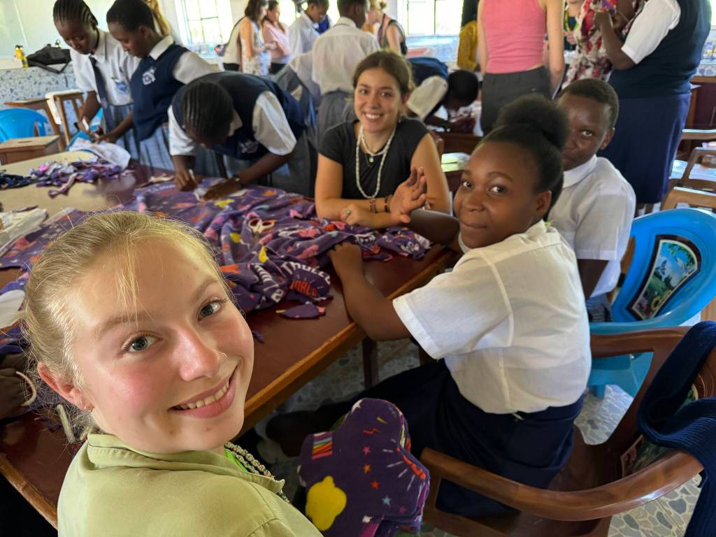Courtesy photo
Julianna Steffens and Kenyan students cut fabric to create reusable menstrual pads.