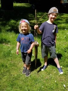 Holton and Hendrik van Amerongen display a whopper from the Sportsmens Club pond. Courtesy photo.