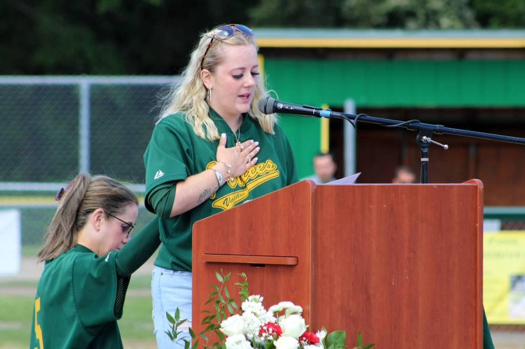 Alex Bruell photo
Sue Hall receives a hand of support during an emotional moment in her speech remembering and celebrating her dad.