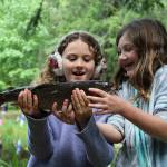 Alex Bruell photo
Gwendolyn Rose, 8 (left) and Joss Moe, 8, marvel at the trout that Gwendolyn caught and Joss reeled in.