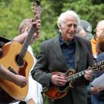 Tom Hughes Photo
Guitarist Mark Wells and mandolinist Paul Colwell play with the Judd Creek Gospel Singers.