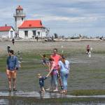 Families visit Point Robinson Park for the Low Tide Festival. (Jim Diers photo.)