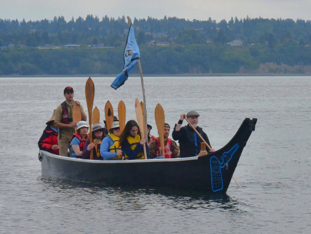 The Blue Heron Canoe paddled over from Des Moines to join in the celebration. (Jim Diers photo.)