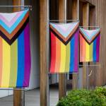 Pride flags hang outside the Vashon Center for the Arts building. (Terry Donnelly photo.)