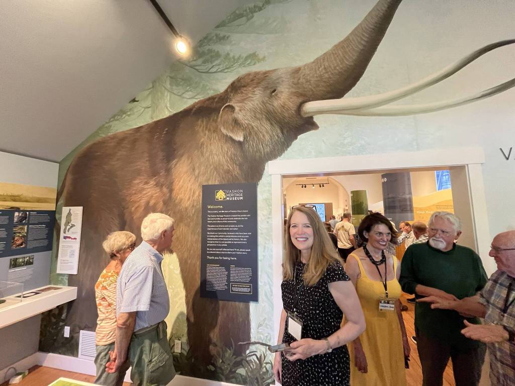 Elsa Croonquist welcomes visitors to the grand reopening of the Vashon Heritage Museum. (Jim Diers photo.)