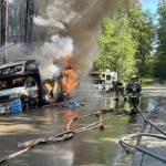 Firefighters battle a fire in an RV in the late afternoon of July 10. (Vashon Island Fire Rescue photo.)