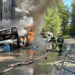 Firefighters battle a fire in an RV in the late afternoon of July 10. (Vashon Island Fire Rescue photo.)