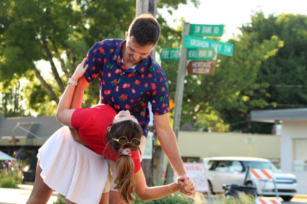 A pair dances in the afternoon light to the music of Portage Fill. (Alex Bruell photo)