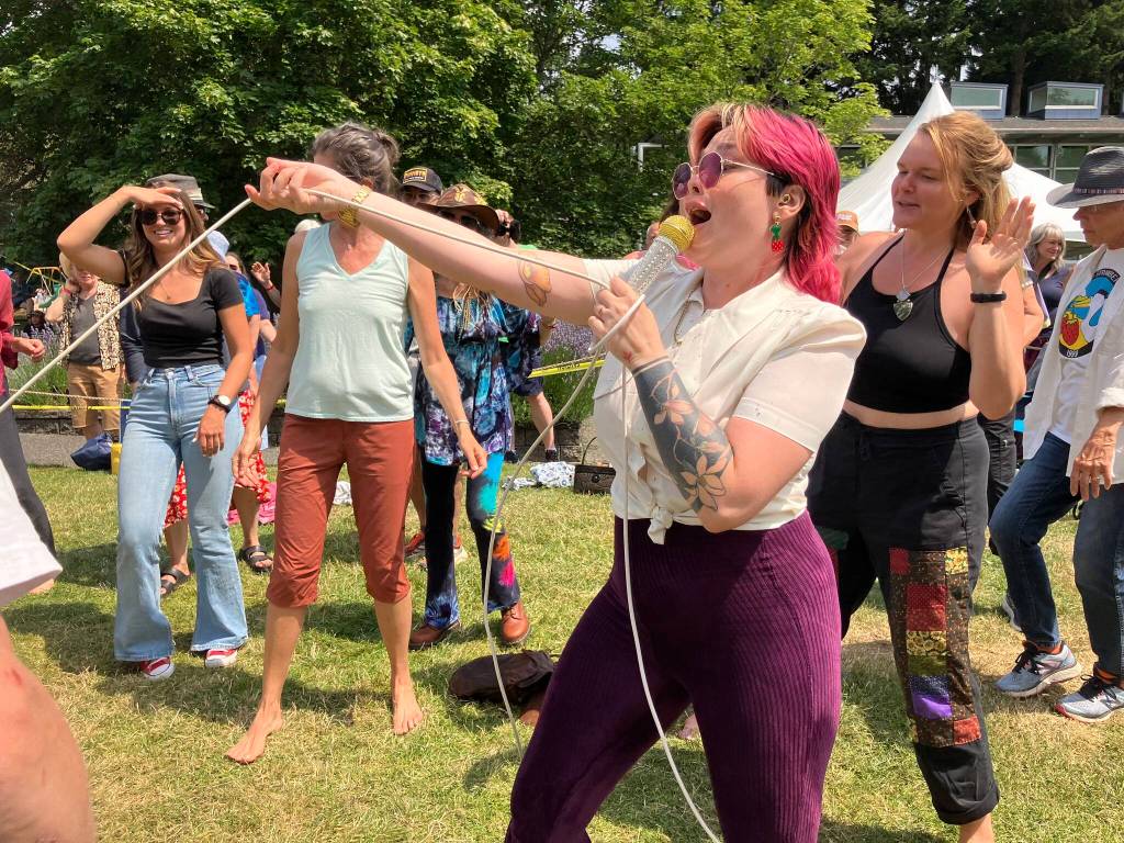 Glitterfox singer Solange Igoa delighted the dancing crowd by joining them for the bands final song. (Elizabeth Shepherd photo)