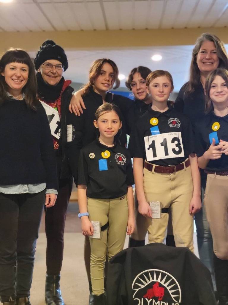 Olympus Pony Club members at the Northwest Regional Quiz Rally included (front row, left to right) Juliette Kelly, Guinevere Kelly, and Vivian Grace. (Back row, left to right) Katie Vaughan (parent/chaperone), Susan McClain, Emmy Archambault, Addie Davidson, Katherine Grace (parent/chaperone). (Courtesy photo.)