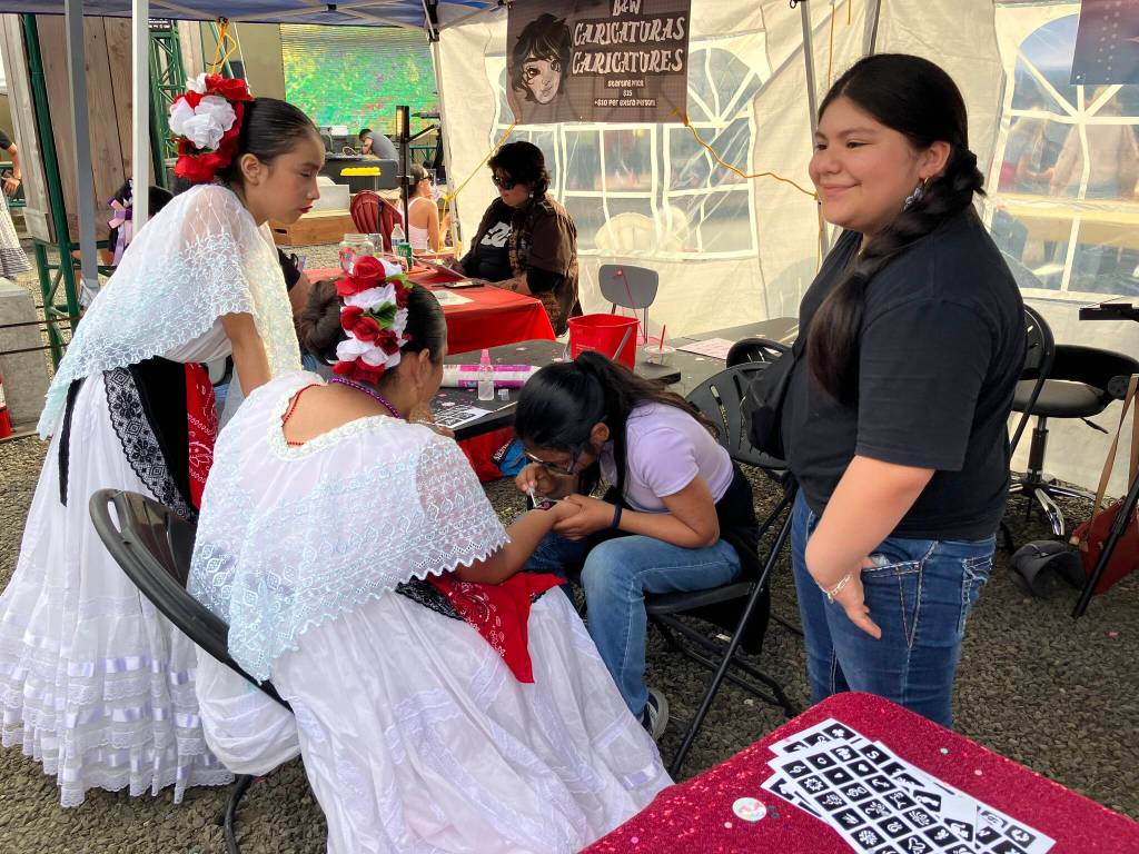 Booths run by entrepreneurial island youth included this one  offering glittery nail art. (Elizabeth Shepherd photo)