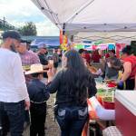 Waiting in line gave families time to figure out what to eat at the Mercado. (Elizabeth Shepherd photo)