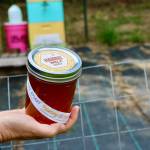 Islander Jenna Riggs delivers these jars of her harvested honey to encourage others to donate directly to the Kamala Harris campaign. (Aspen Anderson photo.)